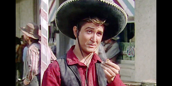 Eugene Iglesias as Johnny Sombrero, the fast gun hired by claim jumper boss Rob Lacy in The Duel at Silver Creek (1952)
