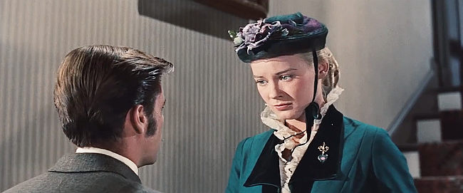 Hope Lange as Zee as husband Jesse James (Robert Wagner) prepares to head out on another 'job' in The True Story of Jesse James (1957)