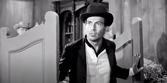 Hurd Hatfield as Moultrie, the dime novelist following William Bonney's exploits in The Left Handed Gun (1958)