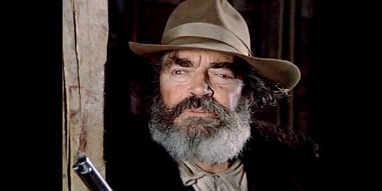 Jack Elam as J. Pete Hankins, uncle to the Hankins brothers in The Winds of Autumn (1976)