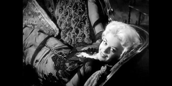 Jacqueline Fontaine as saloon singer Jacqueline Fontaine in The Daltons' Women (1950)