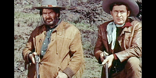 Jeff York as Hank Breckenridge and Fess Parker as John 'Doc' Grayson await the next charge by the Indians in Westward Ho the Wagons! (1956)