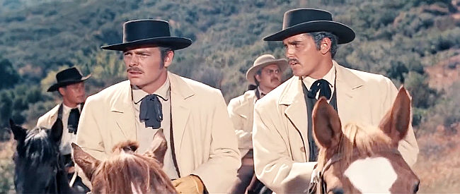 Jeffrey Hunter as Frank James (right) trying to convince Jesse (Robert Wagner) to call off the Northfield job in The True Story of Jesse James (1957)