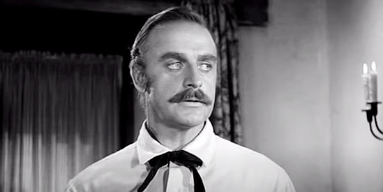 John Dehner as Pat Garrett, trying to steer William Bonney clear of trouble in The Left Handed Gun (1958)