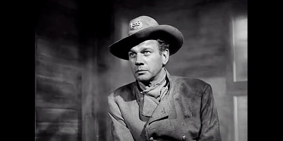 Joseph Cotton as Col. Clay Tucker, weighing whether to wear the Union blue in Two Flags West (1950)