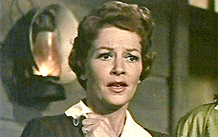 Julie Bishop as Kate Johnson, scared about her sons' safety during a stampede in The Big Land (1957)
