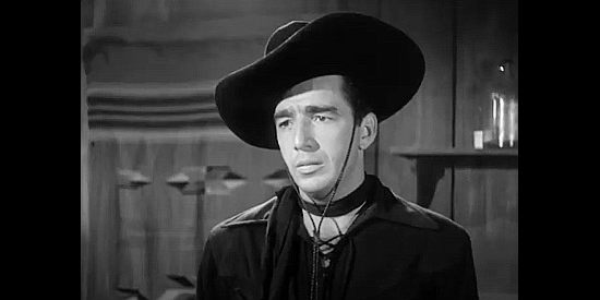 Lash LaRue, arriving in Navajo and being mistaken for a member of the Dalton gang in The Daltons' Women (1950)