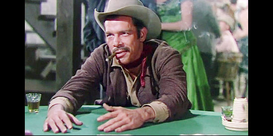 Lee Marvin as Tinhorn Burgess, one of the men aligned with Rob Lacy in The Duel at Silver Creek (1952)