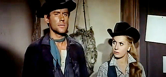 Luigi Giuliani (Jim Reed) as Clark Harrison, showing up at the sheriff's office with Cora (Germana Monteverdi Mercedes) looking for answers in Ruthless Colt of the Gringo (1966)
