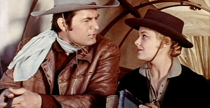 Fess Parker as John 'Doc' Grayson and Kathleen Crowley as Laura Thompson in Westward Ho the Wagons! (1956)