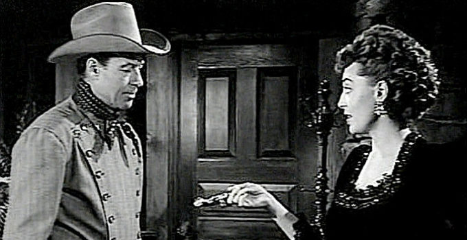 Marie Windsor as Adelaide showing Shadrach Jones (Bill Elliott) her derringer, as proof that she didn't kill his brother in The Showdown (1950)