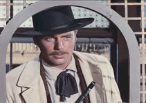 Robert Wagner as Jesse James, attempting to rob the Northfield bank in The True Story of Jesse James (1957)