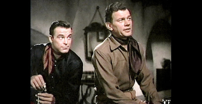 Scotty Brady as Glenn Denbow and Joseph Cotton as his cousin Kirk Denbow in Untamed Frontier (1952)