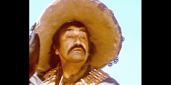 Rafael Albaicin as Paco, Garcia's trusted sidekick in banditry in Whiskey and Ghosts (1974)
