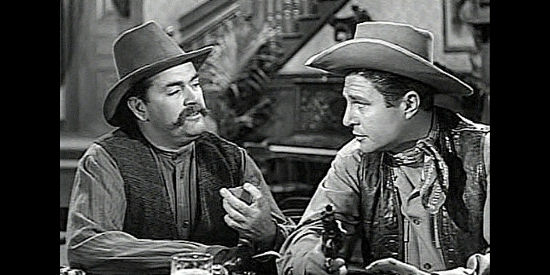 Rhys Williams as Chokechery and Jim Davis as Cochran, two of MacKellar's men in The Showdown (1950)