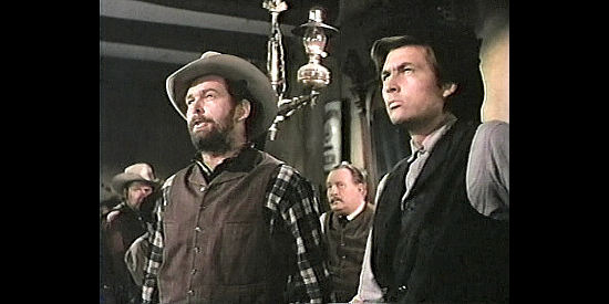 Robert Anderson as Ezra McCloud and Fess Parker as Clem McCloud, two of the homesteaders bucking the Denbows in Untamed Frontier (1952)