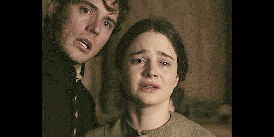 Sam Claflin as Lt. Hawkins with Aisling Franciosi as Claire, about to bring horror to the Carroll home in The Nightingale (2018)