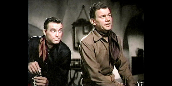 Scotty Brady as Glenn Denbow and Joseph Cotton as his cousin Kirk Denbow in Untamed Frontier (1952)