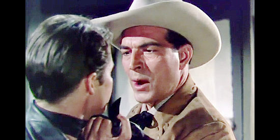 Stephen McNally as Marshal Lightning Tyrone, losing his patience with his young deputy in The Duel at Silver Creek (1952)