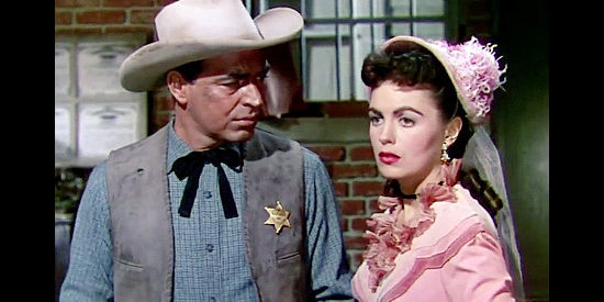 Stephen McNally as Marshal Lightning Tyrone with Faith Domergue as Opal Lacy in The Duel at Silver Creek (1952)