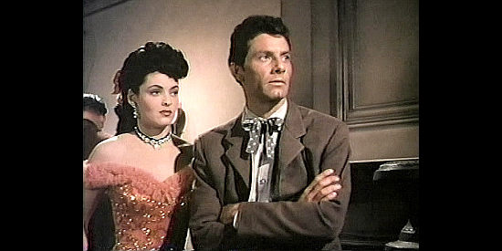 Suzan Ball as Lottie with Richard Garland as Charlie Fentress, the man who loves Jane in Untamed Frontier (1952)