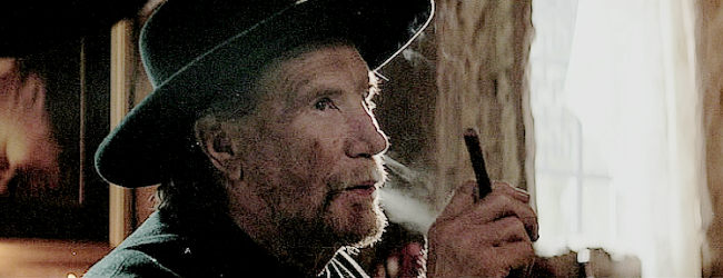 Vernon Wells as Black Jack Bennett, one of the names on the bounty list in No Name and Dynamite (2022)