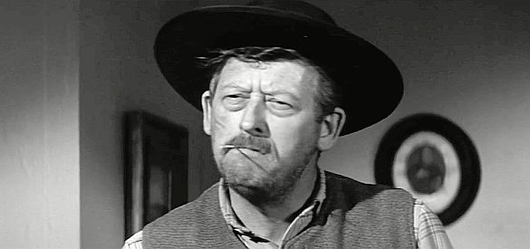 Blu Wright as Farmer Brown, figuring out the surest way to gun down Tom Sabin in Four Fast Guns (1960)