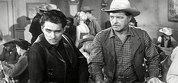 Brett Halsey as Johnny Naco and James Craig at Tom Sabin, meeting over a drink in Four Fast Guns (1960)