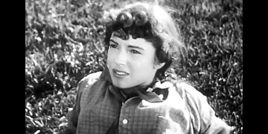 Dolores Prest as Jerri Marshall, the young girl who spars with fellow teen Bill Walton in Born to the Saddle (1953)