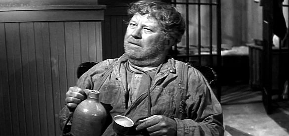 Edgar Buchanan as Dipper, the drunk who's taken up residence in the Purgatory jail in Four Fast Guns (1960)