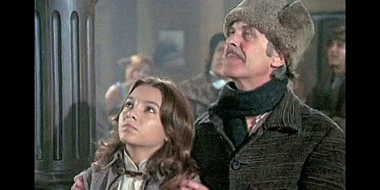 Elisabetta Virgili as Mary Chambers and Filippo La Neve as Tom Jarrell, urging Buck to help them win a bet in The Great Adventure (1975)