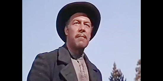 George Kennedy as Nathan Dillon, the man who wants Chad as his bond servant in The Little Shepherd of Kingdom Come (1961)