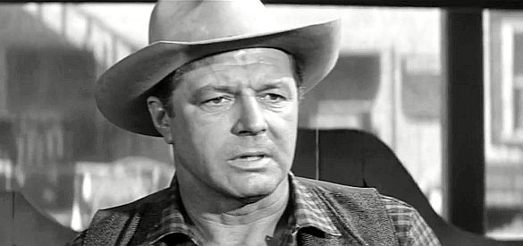 James Craig as Tom Sabin, the man who accepts the role of town tamer in Purgatory in Four Fast Guns (1960)