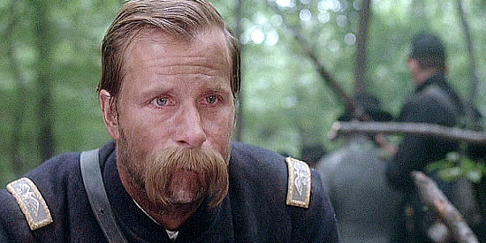 Jeff Daniels as Col. Joshua Lawrence Chamberlain, meeting a wounded soldier after the attack on Little Round Top in Gettysburg (1993)