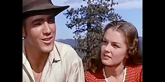 Jimmie Rodgers as Chad with Luana Patten as Melissa Turner, talking about their future in The Little Shepherd of Kingdom Come (1961)