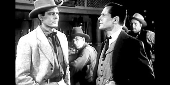 Leif Erickson as Bob Marshall, at odds with Matt Daggett (Donald Woods) again in Born to the Saddle (1953)