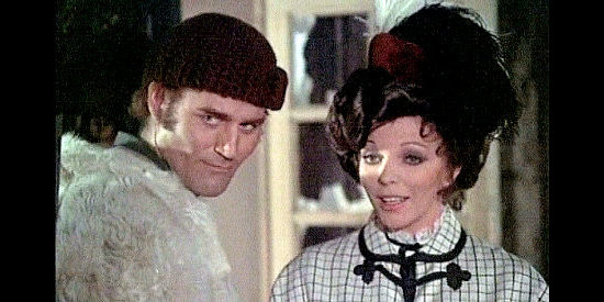 Manuel de Blas as John McKenzie with Joan Collins as Sonia Kendall in The Great Adventure (1975)