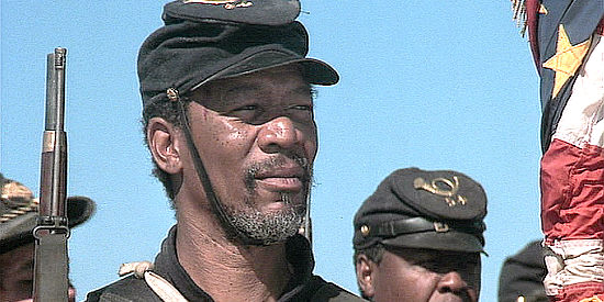 Morgan Freeman as Sgt. Maj. John Rawlins, father figure to some of the men in the 5th an a confidant to Shaw in Glory (1989)
