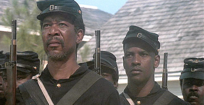 Morgan Freeman as Sgt. Maj. John Rawlins and Denzel Washington as Pvt. Trip, marching into action in Glory (1989)