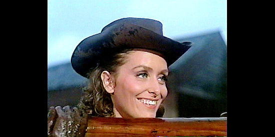 Sandra Smith as Joanna Royce, the pretty freighter with a nose for business and an eye for Calhoun in Scalplock (1966)