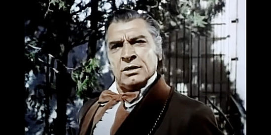 Anthony Caruso as Don Miguel Ruiz, the rich Mexican who hires Clay and his gang to transport his wife to San Francisco in The Desperate Mission (1969)