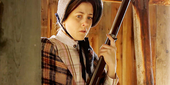 Elise Groves as Rachel Taylor, feeling threatened by the wounded Rebel in her barn in Civil Love (2012)