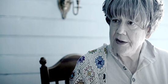 Joanne Greene as Grandma Rivers, a woman reluctant to leave her Atlanta home in The Burning of Atlanta (2020)