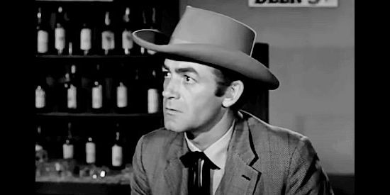 Mark Stevens as Velvet Clark, a gambler with a crooked means of making a living in Gunsight Ridge (1957)