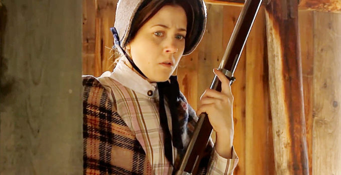 Elise Groves as Rachel Taylor, feeling threatened by the wounded stranger in her barn in Civil Love (2012)