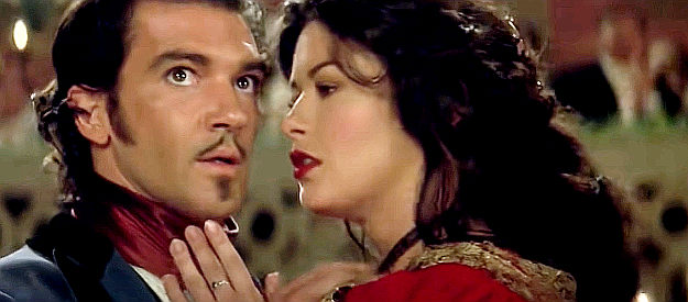 Antonio Banderas as Alejandro Murrieta, aka Zorro, dancing with Elena Montero (Catherine Zeta-Jones) in The Mask of Zorro (1998)