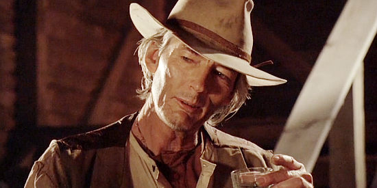 Billy Drago as Jesse Evans, forcing Longley into a poker game he can't win in Copperhead (2008)