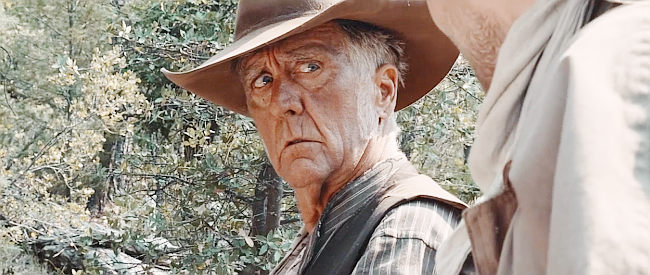 Dan Higgins as Bascom, the lawman who decides to use an outlaw's woman as bait in Skinwalker (2021)