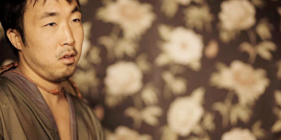 Daniel J. Kim as Kurukan, the man determined to restore his family's honor in The Last Wolf of Ezo (2015)