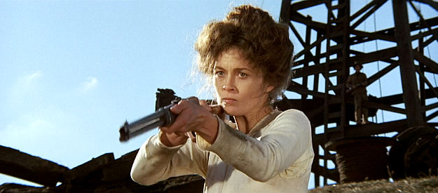 Faye Dunaway as Lena Doyle, grabbing her rifle when her estranged father comes calling in Oklahoma Crude (1973)